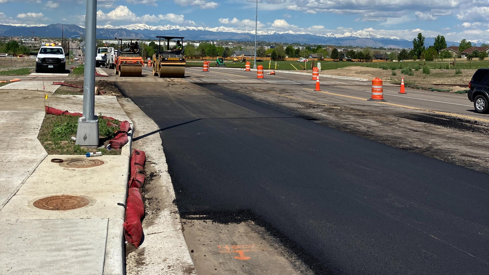 Stormwater filter sock in curb adjacent to new roadway