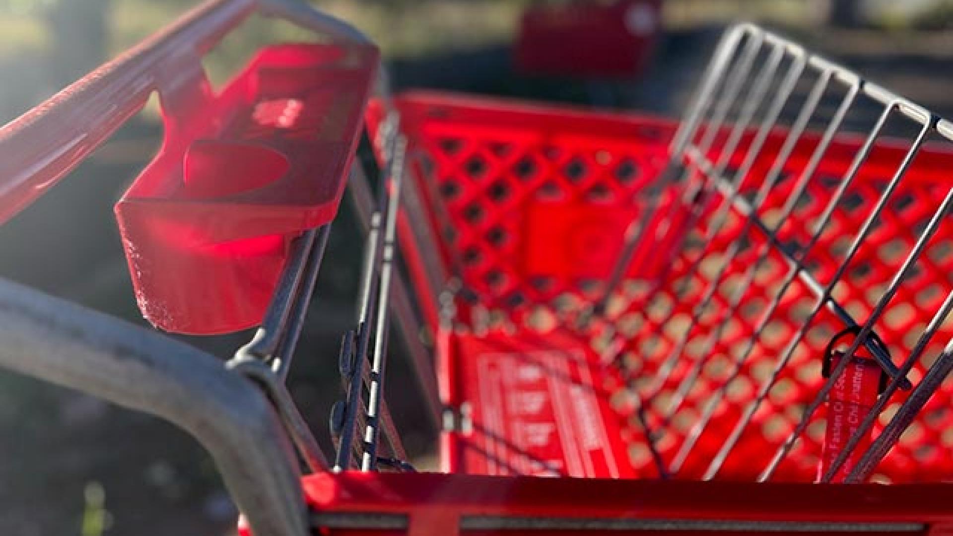An abandoned red shopping cart.