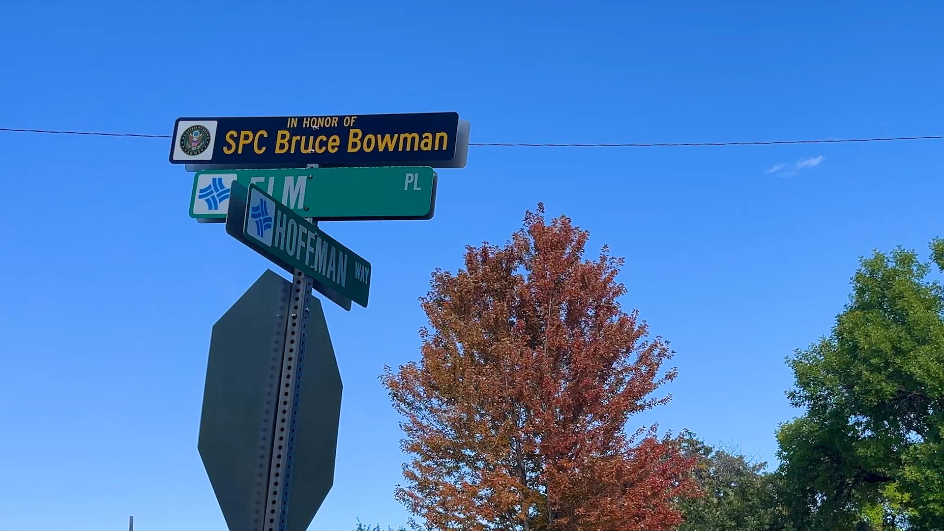 Honorary street name sign Specialist Five Bruce Allen Bowman (Elm Place).