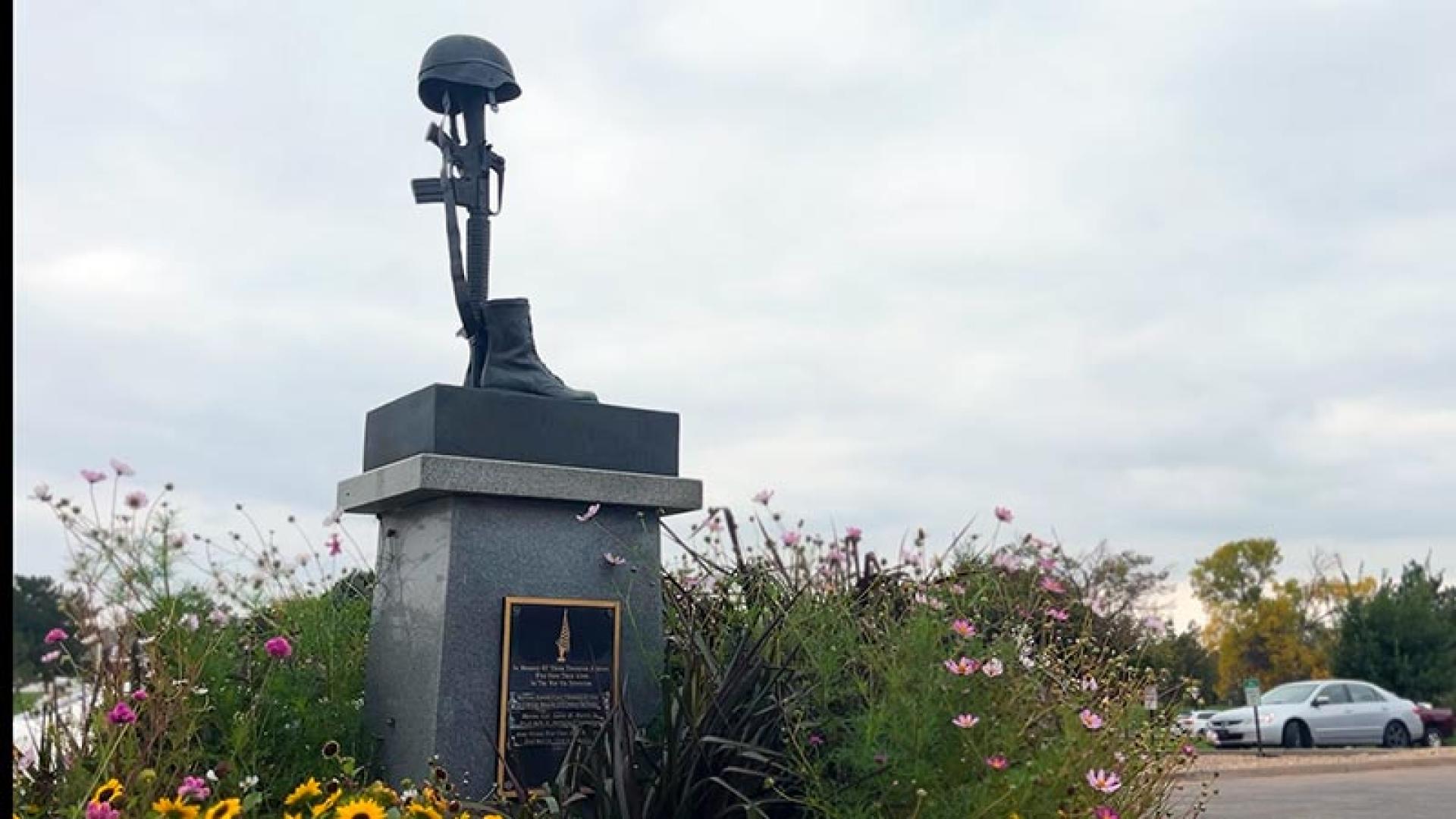 "Thornton Remembers" bronze sculpture on stone monolith installed at the front entrance of the Margaret Carpenter Recreation Center.
