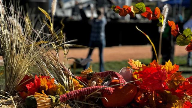 Harvest Fest event with hay stack and band playing