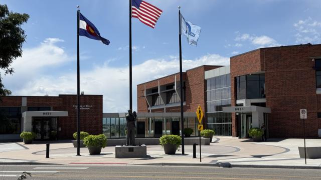 Front of police department with flags flying