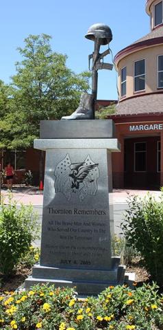 "Thornton Remembers" bronze sculpture on stone monolith installed at the front entrance of the Margaret Carpenter Recreation Center.