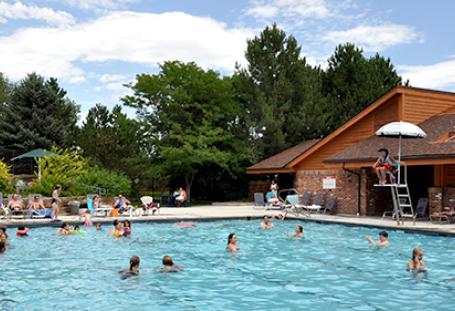 Adults and children in the Park Village Pool.